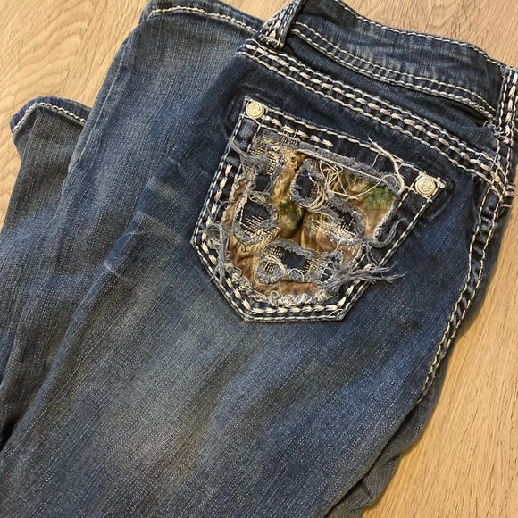 grace in la camo jeans